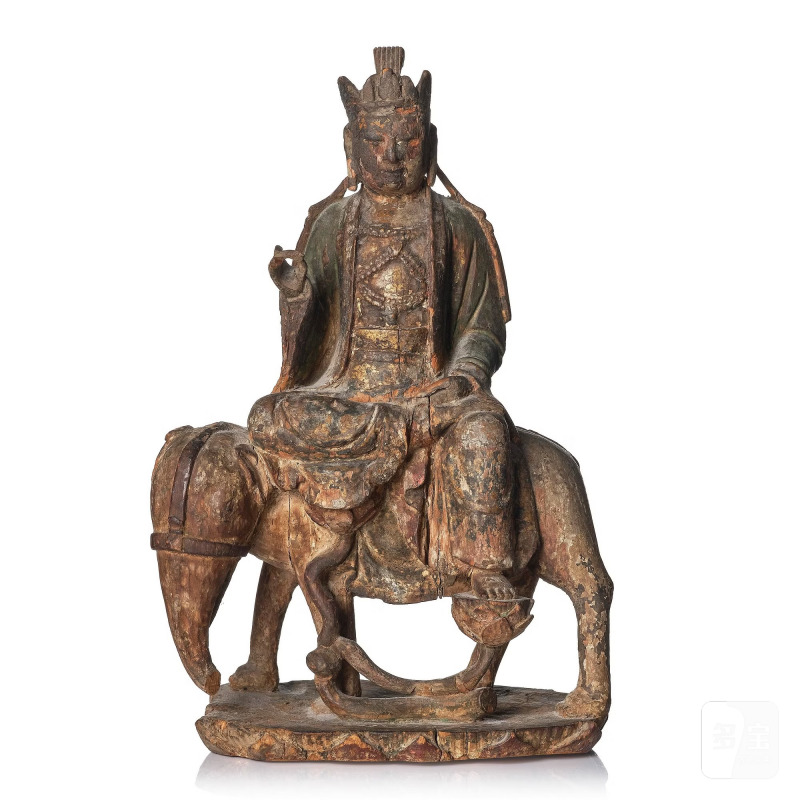 A wooden sculpture of Samantabhadra on an elephant,